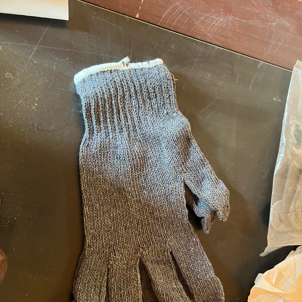 Gray to black work gloves